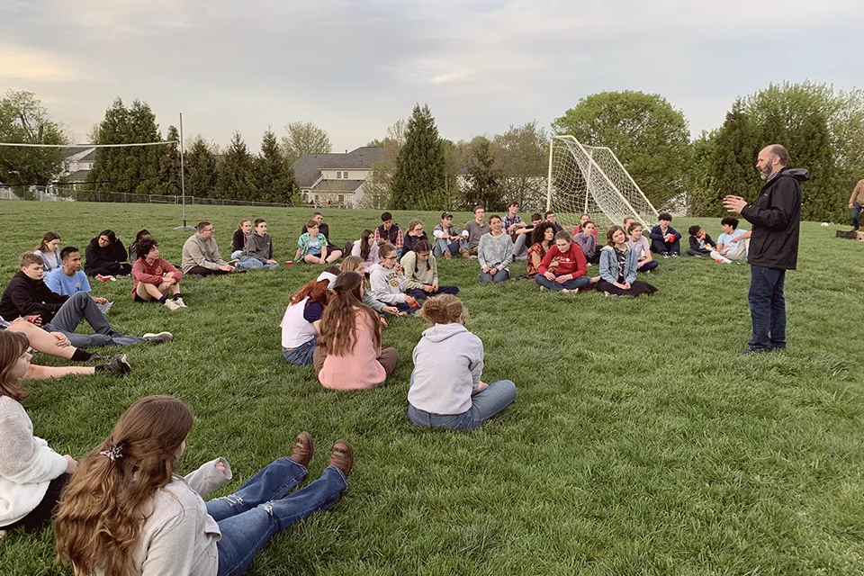 Youth group meeting on the soccer fields.